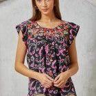 Top features a Round Neckline, Flutter Sleeves, and Floral Embroidery Throughout the Top
