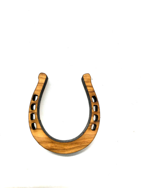 Horseshoes as a Christmas tree pendant made of olive wood