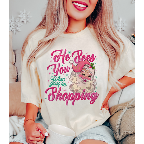 He Sees You When You're Shopping Graphic Tee