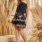 Dress with Criss Cross Neckline, Floral Embroidery on Bottom. Lined, Black