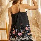 Dress with Criss Cross Neckline, Floral Embroidery on Bottom. Lined, Black