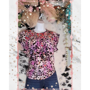 Flutter Woven Top features Round Neckline with Floral Embroidery, Woven