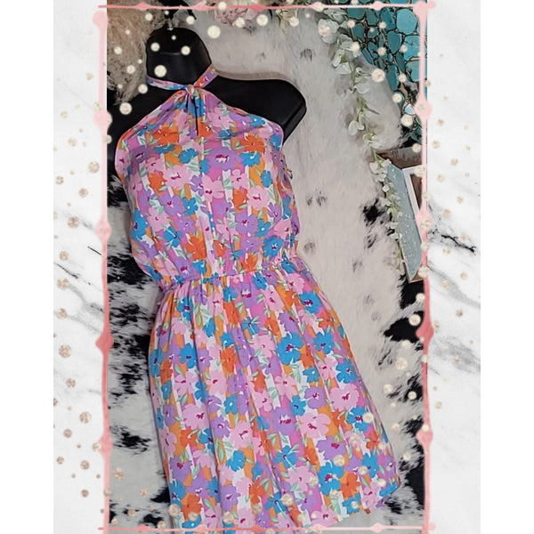 Romper with Criss Cross Neckline, Elastic Waist, Flared Bottoms, Relaxed. Woven, lined.